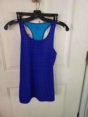 Camiseta sin mangas Reebok LG azul ligeramente usada Foto 1 de 4