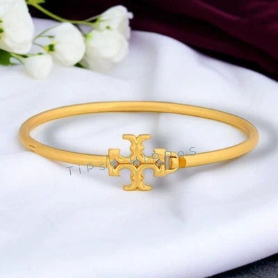 PULSEIRA DE PUNHO DOBRADIÇA TORY BURCH ELEANOR - Imagem 1 de 4