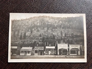 RPPC "Saloon Row" Street Scene w/ 3 Saloon - Montana? Arizona? Idaho? 1910s - Picture 1 of 2