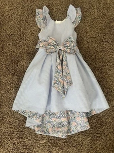 Vestido alto-bajo Seersucker para niña Rare Editions con lazo floral. Talla 4/4T - Imagen 1 de 7