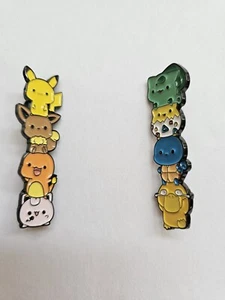 2 Pokemon Pins Neu Pikachu, Eevee, Charmander, Jigglypuff, Bulbasaur  - Bild 1 von 5