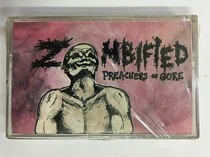 ZOMBIFIED - PREACHERS OF GORE - MUSICASSETTA NUOVA E SIGILLATA RARA - Picture 1 of 2