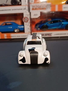 JADA TOYS 1939 DODGE AIRFLOW TANKER 1/64 WHITE AND BLACK COW PRINT SPECIAL - Picture 1 of 6