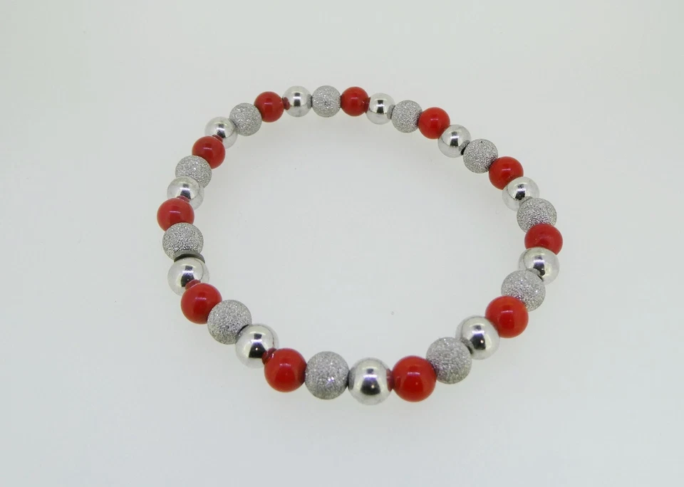 BRACCIALE ELASTICO IN ARGENTO 925 STERLING E CORALLO SFERE LUCIDE E DIAMANTATE - Immagine 1 di 2