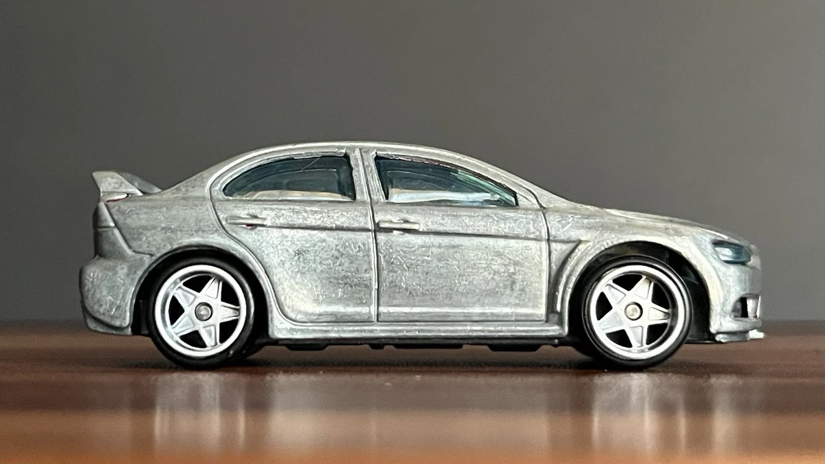 Welly Modellino Auto Mitsubishi Lancer Evolution Evo X – Scala 1/34 – Blu Metallizzato – Porte Apribili - 5