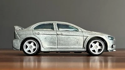 RARE Hot Wheels Factory Raw Unpainted Unspun 2008 Mitsubishi Lancer Evolution X - Image 1 of 4