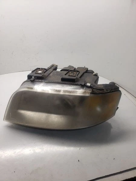 Faro halógeno izquierdo conductor 6 cilindros compatible con 02-04 AUDI A6 1077115 Foto 1 de 4