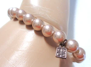 GIVENCHY Logo Tag, Champagne Color Glass Pearls, Stretch Bracelet. - Picture 1 of 3