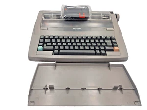 Máquina de escribir electrónica Sharp QL-120 de colección coleccionable y cinta nueva - Imagen 1 de 24