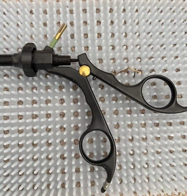 Olympus A6997 Laparoscopic Insulated Handle w/ Ratchet And Grasper - Image 1 of 4