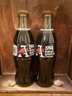 2 bouteilles de Coca-Cola 1994 Arkansas Razorback National Basketball Champs.
