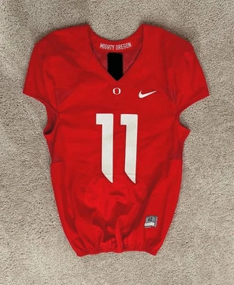 Camiseta de práctica Nike Oregon Ducks emitida por fútbol americano 2016 QB #11 Travis Jonsen RARA Foto 1 de 4