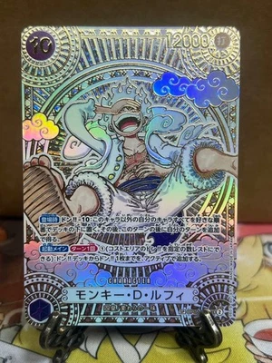 Luffy OP05-119 Gold SEC Parallel Fist of Divine Speed 3rd Anniversary ONE PIECE - Image 1 of 2