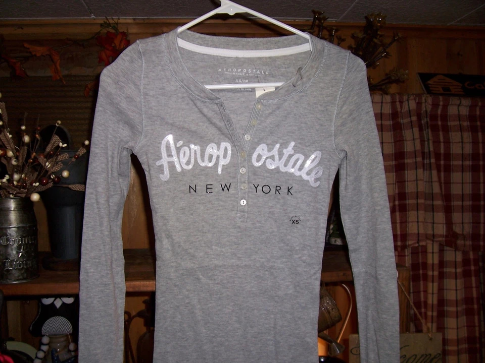 CAMISA AEROPASTLE NIÑAS MANGA LARGA TALLA XS TP COLOR GRIS NIÑAS INVIERNO ROPA  Foto 1 de 1