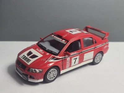 Kinsmart Mitsubishi Lancer Evo #7 Tommi Makinen Rojo WRC Finlandia Rally Escala 1/36 Foto 1 de 4