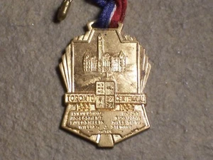 Pin ficticio medallón centenario vintage Toronto Canadá 1934 1834 - 1934 colección  - Imagen 1 de 6