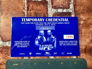 UFC 116: BROCK LESNAR vs. CARWIN, STEPHAN BONNAR CREDENTIAL/PRESS PASS wiegt - Bild 1 von 3
