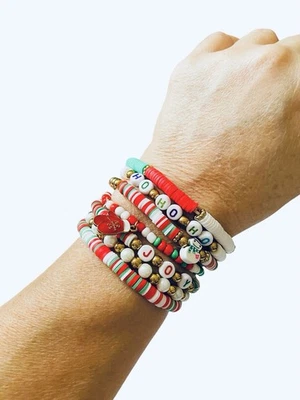 Navidad, 7 Pulseras Elásticas Apilables, Pulsera “HO HO HO” y Diseño “JOY” Foto 1 de 4