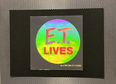 E.T. 1982 de colección PEGATINA HOLOGRAMA CARAMELO PIEZAS LIVES Reese Premio Premium RARO AÑOS 80 Foto 1 de 3