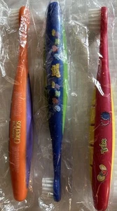 VINTAGE KINDERZAHNBÜRSTEN WERBUNG GEN MILLS MÜSLI (3) NEU IN VERPACKUNG REDUZIERT - Bild 1 von 3