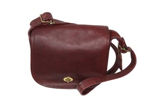 coach tea rose saddle bolsa