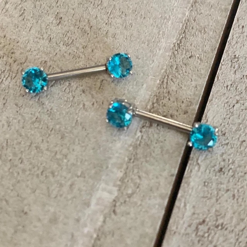 PAIR OF AQUA BLUE GEM NIPPLE RINGS BARBELLS SHIELDS PIERCINGS NEW 14 GAUGE 1/2" - Imagem 1 de 1