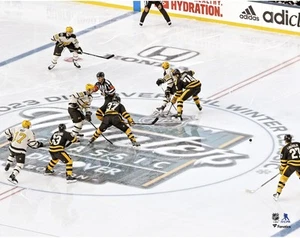 Patrice Bergeron Bruins Unsigned Opening Face-Off of 2023 Winter Classic Photo - Picture 1 of 1