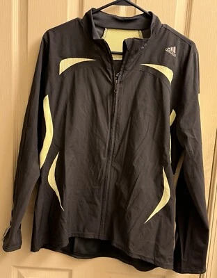 Chaqueta Adidas ClimaProof Wind para mujer grande negra/amarilla formación para correr Foto 1 de 4