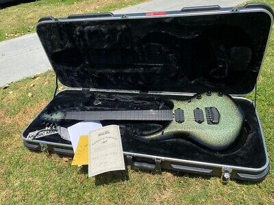 Music Man BFR John Petrucci Majesty -Gremlin Green Sparkle  6.8 lbs