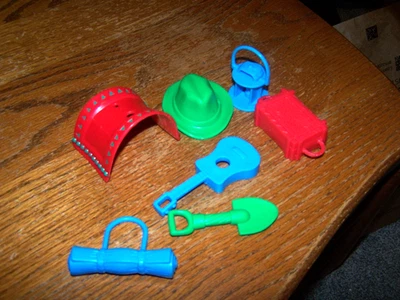 Buckaroo Game by Milton Bradley 2004 -Spare parts only saddle, shovel, guitar, - Image 1 of 4