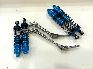 Driveshafts CVD + BIG BORE ALUMINUM Shock W/4mm shaft  Traxxas Rustler VXL 2WD B - Picture 1 of 3