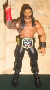 FIGURA DE LUCHA LIBRE WWE MATTEL ELITE ROMAN REINS CON CINTURÓN DE CAMPEONATO - Imagen 1 de 1