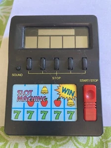 SLOT MACHINE GIOCO ELETTRONICO VINTAGE RADIO SHACK portatile mini LCD - Foto 1 di 6
