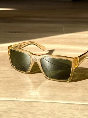Gafas de sol Prada ámbar rectangulares - marco dorado transparente, lentes verdes Foto 1 de 4
