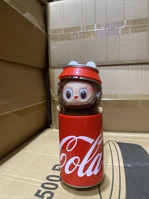 The Monster Coca Cola Secret Vinyl Plush Doll Inside Can Case - Image 1 of 4