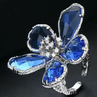 Anillo enchapado en oro blanco de 18k flor grande azul hecho con cristal de Swarovski ajustable Foto 1 de 4