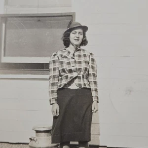 Vintage B&W Photo Snapshot of Young Lady in Plaid & Skirt Standing by Milk Can - Picture 1 of 14