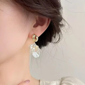 fashionable gold ear pendants featuring lovely shell and flower styles - Picture 1 of 5