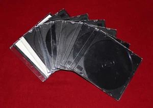 Sieben CD-Hüllen (glasklar/schwarz), 5mm dünn - Bild 1 von 5