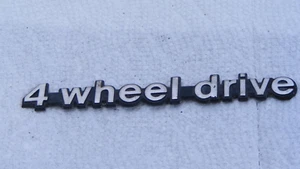 Jeep Grand Wagoneer 4 wheel drive emblem - Picture 1 of 2