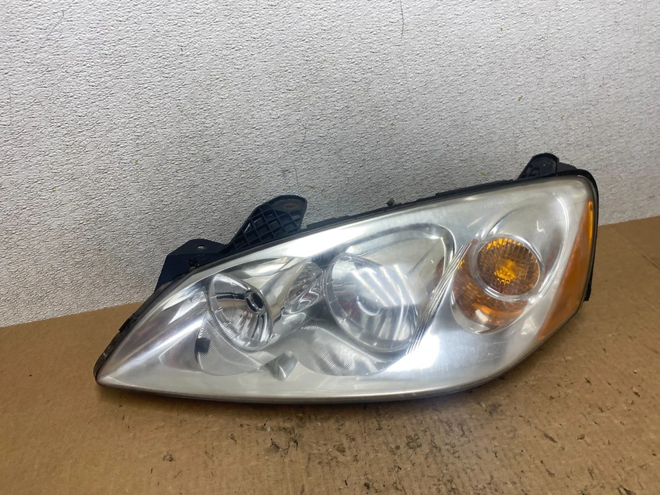 Faro halógeno lateral izquierdo Pontiac G6 2005 a 2009 OEM Q7999 DW Foto 1 de 4