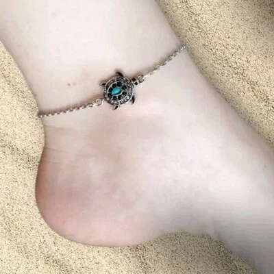 Cavigliera bracciale catenina argento acciaio tartaruga moda donna uomo estate - Immagine 1 di 4