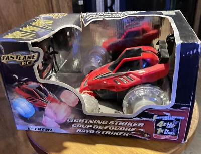 TOYS R US - NEW - Fast Lane X-TREME LIGHTNING STRIKER RC Car - Image 1 of 4