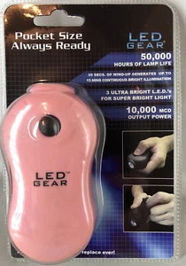 LED Gear Wind Up LED Light Pocket Size 50,000 Hours Lamp Life Pink Silver Black - Picture 1 of 4