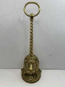 Tope de puerta cabeza de león de latón - Imagen 1 de 18