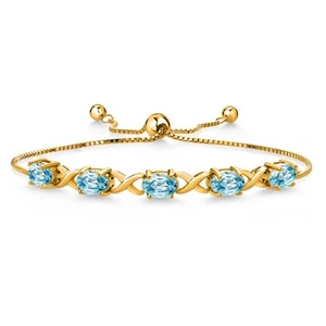 18K Yellow Gold Plated Silver Blue Zircon Bracelet For Women (6.25 Cttw, - Picture 1 of 4