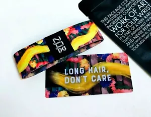 ZOX **LONG HAIR DONT CARE** Silver Strap med Mystery Pkg Wristband w/Card - Picture 1 of 3