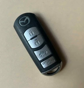 GENUINE MAZDA 4 BUTTON REMOTE SMART CAR KEY FOB - FREE DELIVERY - Picture 1 of 2