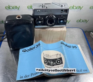 FOTOCAMERA VINTAGE ROLLEI 35 HONEYWELL ARGENTO 35 MM TESSAR 1:3.5 F=40MM GERMANIA - Foto 1 di 23