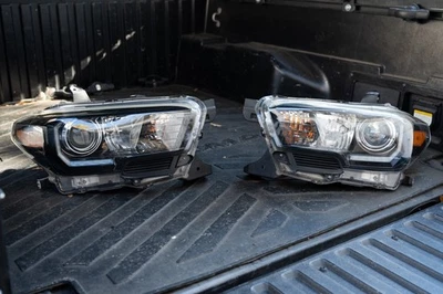 3rd Gen Toyota Tacoma OEM Projector Headlights w/ DRL (2016–2023) Pair - Image 1 of 4